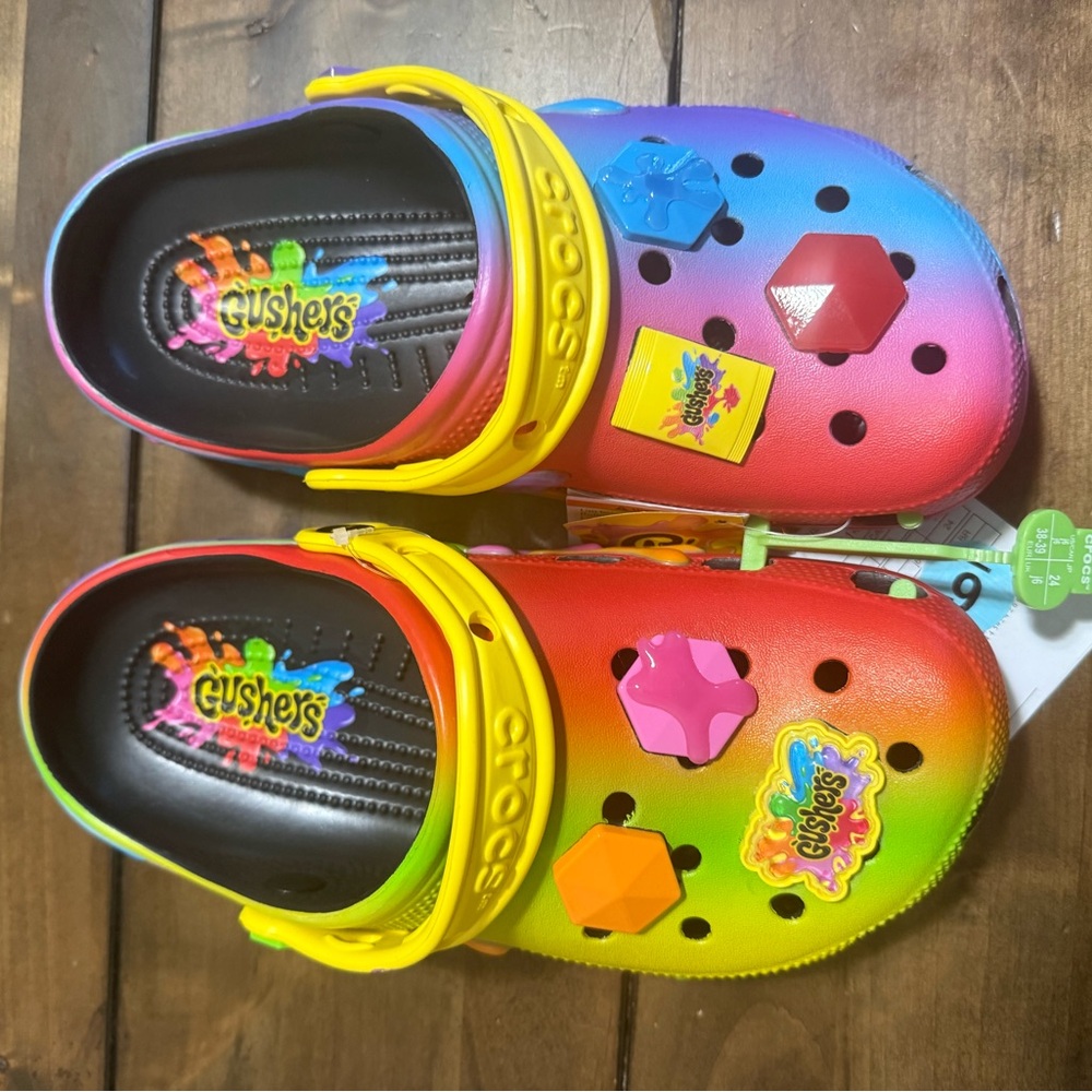 Usher women’s Gushers Rainbow Clogs